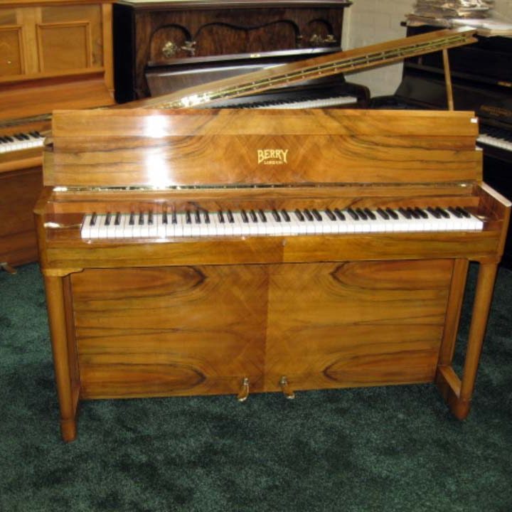 boyd upright grand in honey walnut piano 1