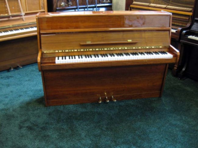 calisia in polished cherry wood piano 1