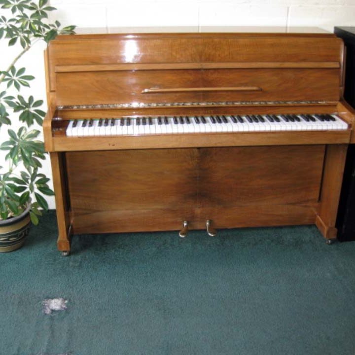 knight in honey walnut piano 1