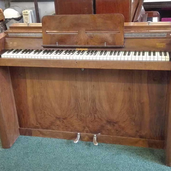eavestaff minipiano in honey walnut