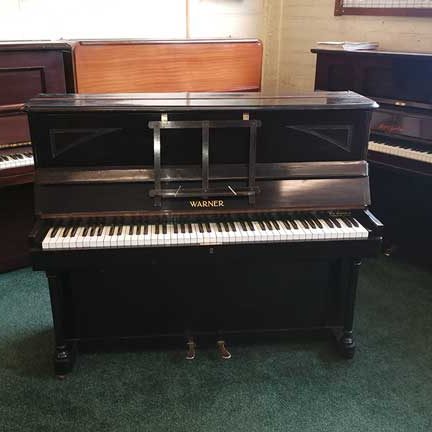Piano for sale or rent, Warner cottage piano supplied by W H Barnes in Ebony/black