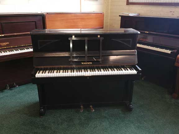 Piano for sale or rent, Warner cottage piano supplied by W H Barnes in Ebony/black